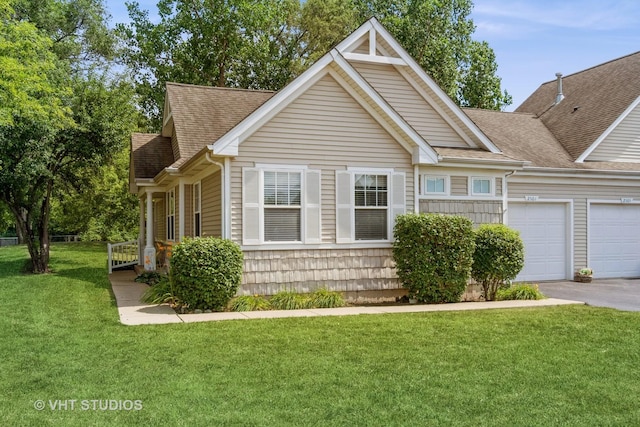 2501 Park Ridge Ct Unit 2501, Crest Hill, IL 60403 - view of front of home featuring a garage, roof with shingles, a front yard, and asphalt driveway