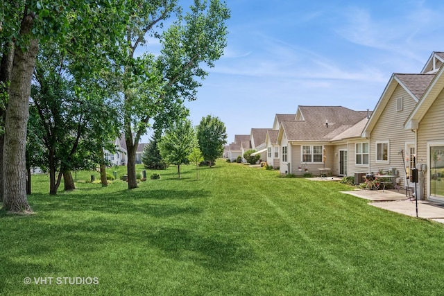 2501 Park Ridge Ct Unit 2501, Crest Hill, IL 60403 - view of grassy yard featuring a patio area