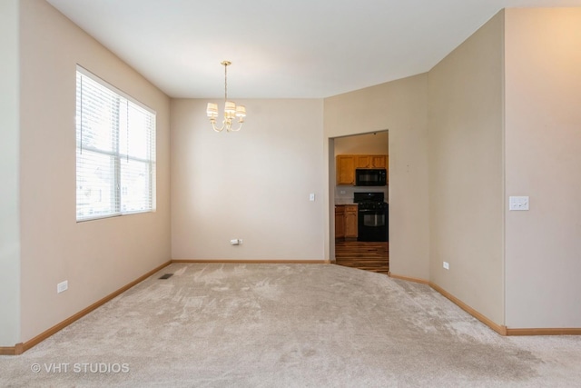 2501 Park Ridge Ct Unit 2501, Crest Hill, IL 60403 - carpeted empty room with a chandelier and baseboards