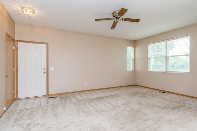2501 Park Ridge Ct Unit 2501, Crest Hill, IL 60403 - carpeted spare room with baseboards and a ceiling fan