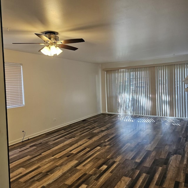 6959 N Ridge Blvd Unit 1C, Chicago, IL 60645 - spare room featuring a ceiling fan and dark wood finished floors