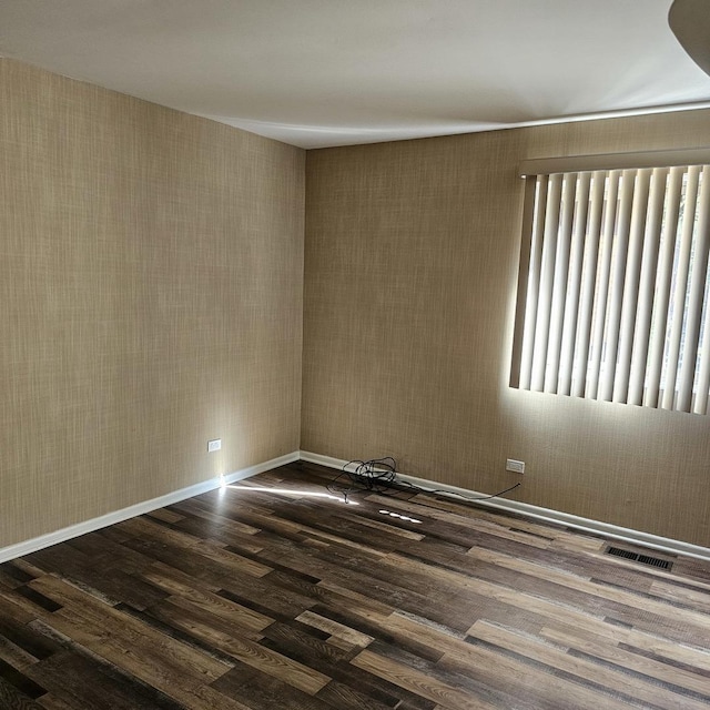 6959 N Ridge Blvd Unit 1C, Chicago, IL 60645 - spare room with wood finished floors and baseboards