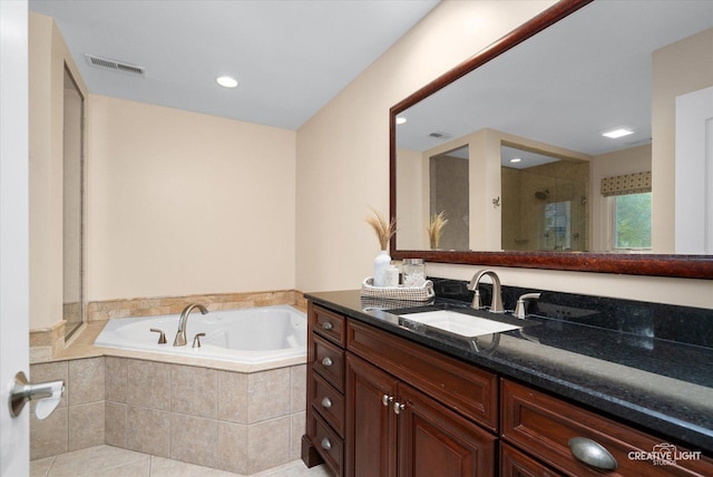 1112 Saratoga Ct, Naperville, IL 60564 - bathroom featuring vanity, a garden tub, a shower stall, recessed lighting, and tile patterned floors