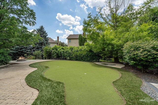 1112 Saratoga Ct, Naperville, IL 60564 - surrounding community featuring an outdoor fire pit, an area to practice putting, and a patio area