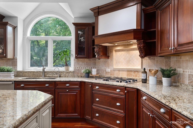 1112 Saratoga Ct, Naperville, IL 60564 - kitchen featuring stainless steel appliances, light stone countertops, tasteful backsplash, glass insert cabinets, and dark wood-style flooring