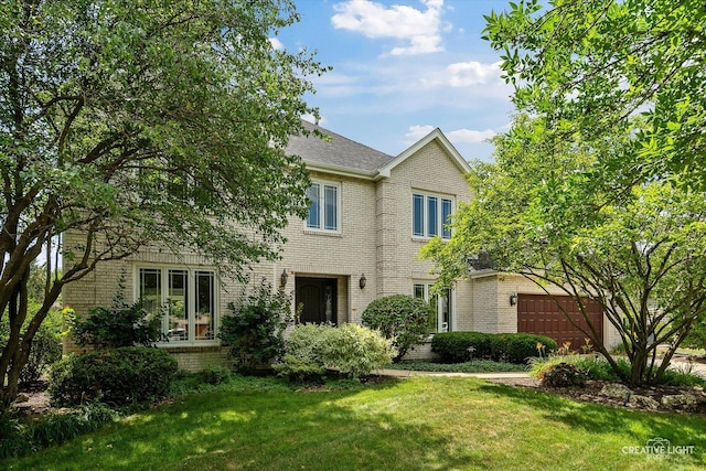 1112 Saratoga Ct, Naperville, IL 60564 - view of front facade with brick siding, a front lawn, and a garage