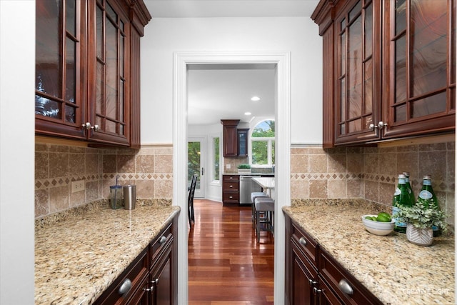 1112 Saratoga Ct, Naperville, IL 60564 - kitchen featuring dark wood-type flooring, stainless steel dishwasher, light stone counters, and decorative backsplash