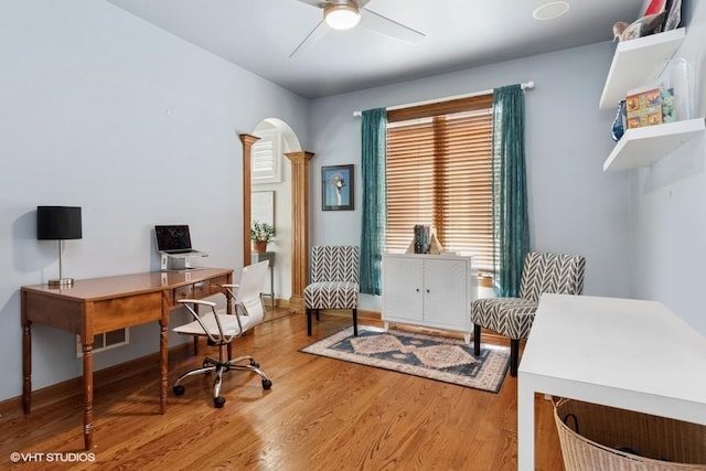 366 W Eggleston Ave, Elmhurst, IL 60126 - home office featuring arched walkways, wood finished floors, a ceiling fan, and ornate columns