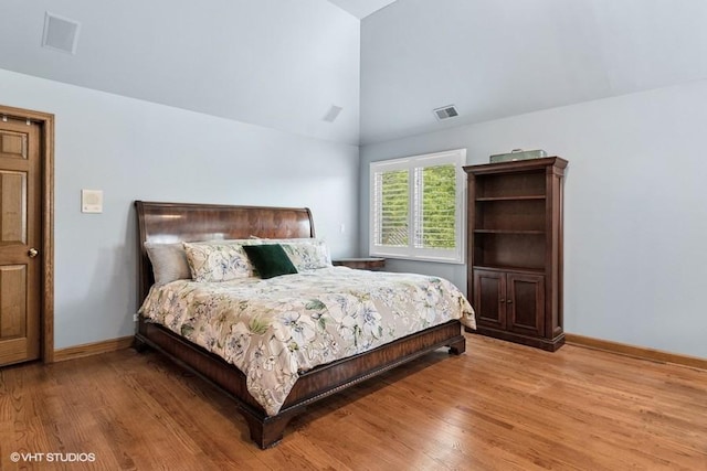 366 W Eggleston Ave, Elmhurst, IL 60126 - bedroom featuring wood finished floors and high vaulted ceiling