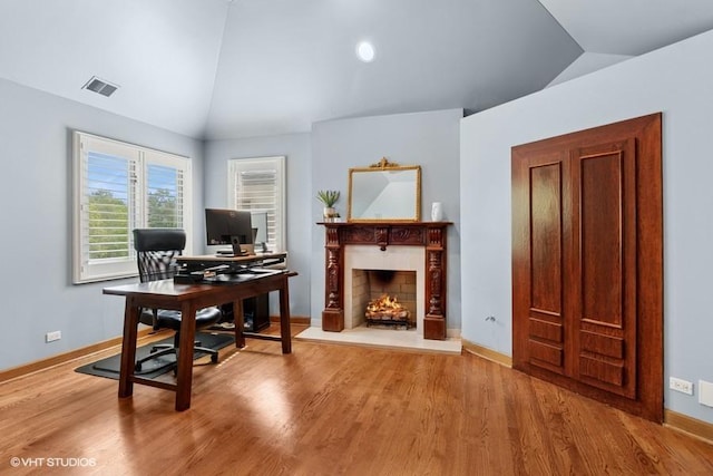 366 W Eggleston Ave, Elmhurst, IL 60126 - office area featuring lofted ceiling, wood finished floors, and a lit fireplace
