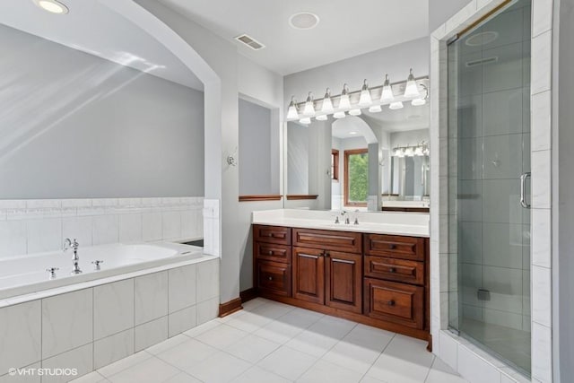 366 W Eggleston Ave, Elmhurst, IL 60126 - full bathroom featuring vanity, a stall shower, a bath, and tile patterned floors