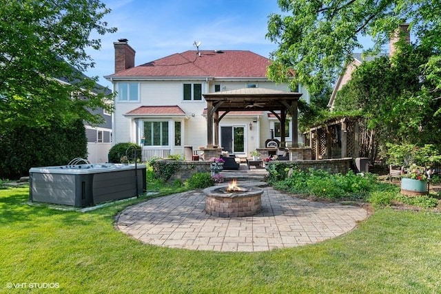366 W Eggleston Ave, Elmhurst, IL 60126 - back of house featuring a fire pit, a gazebo, a patio, a yard, and a chimney