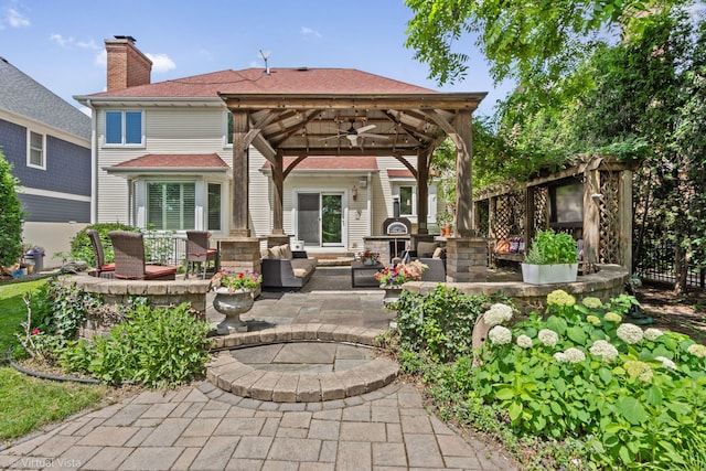 366 W Eggleston Ave, Elmhurst, IL 60126 - back of property featuring ceiling fan, a patio, an outdoor hangout area, and a chimney