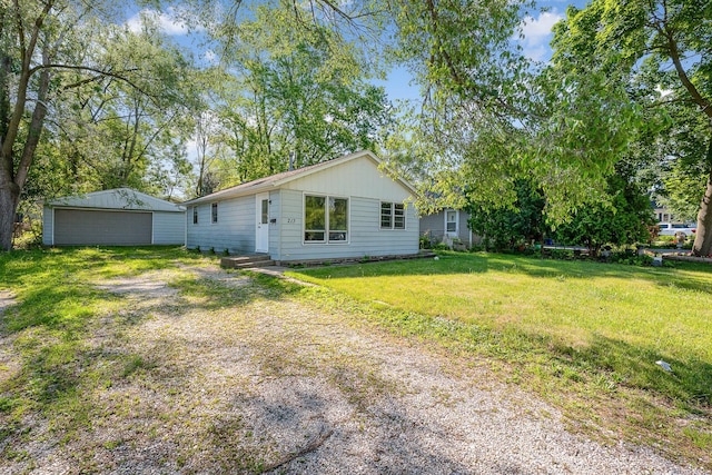 213 Brierhill Dr, Round Lake Park, IL 60073 - view of front of home featuring a garage, a front yard, and an outdoor structure