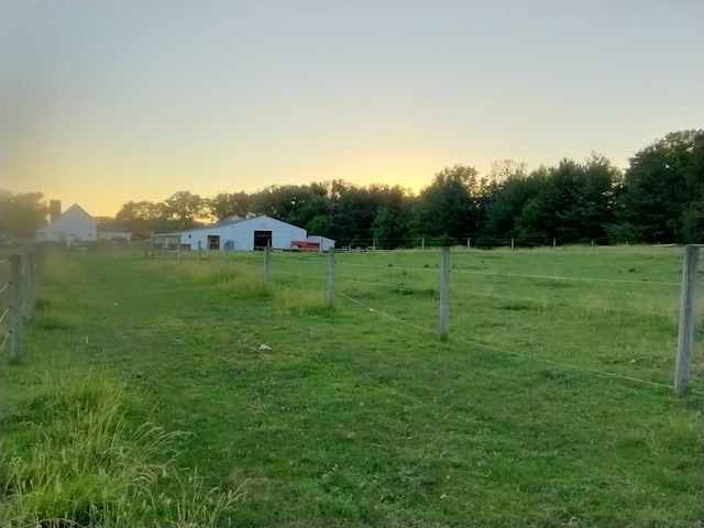29153 S Klemme Rd, Beecher, IL 60401 - yard at dusk featuring a rural view and a detached garage
