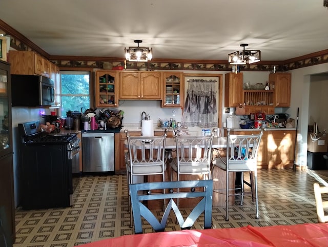29153 S Klemme Rd, Beecher, IL 60401 - kitchen featuring stainless steel appliances, light flooring, brown cabinetry, glass insert cabinets, and pendant lighting