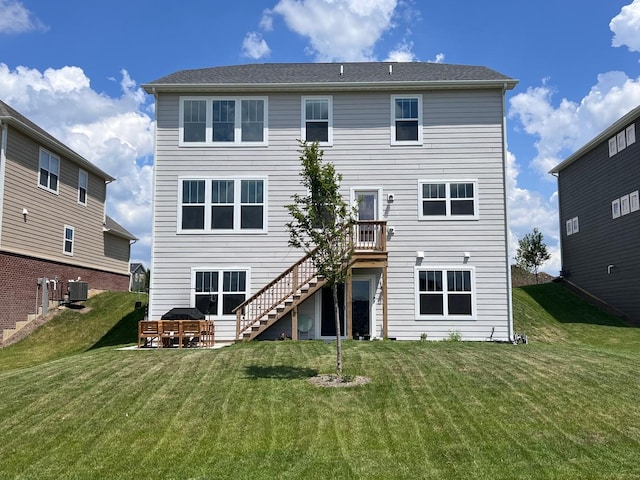 12490 Rossaveal Way, Lemont, IL 60439 - rear view of house with stairs, a yard, and a deck