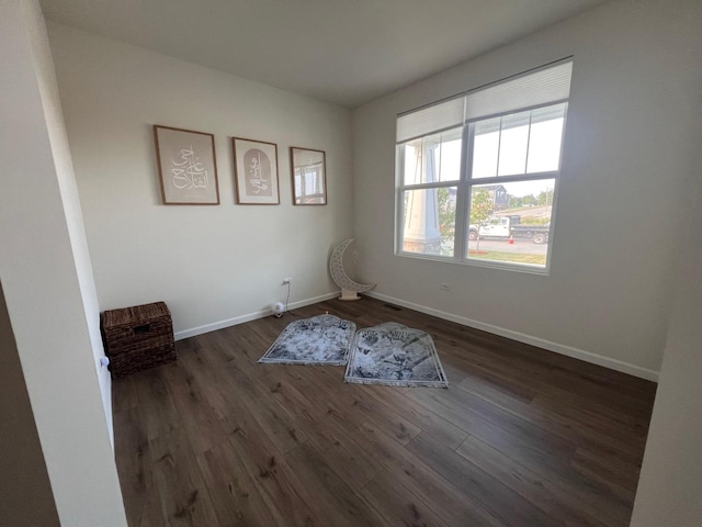 12490 Rossaveal Way, Lemont, IL 60439 - unfurnished room featuring wood finished floors and baseboards