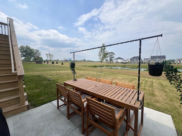12490 Rossaveal Way, Lemont, IL 60439 - view of patio / terrace with outdoor dining space and a water view