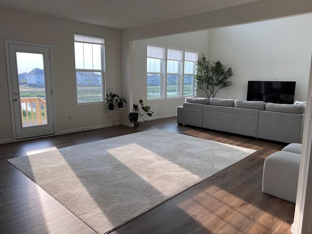 12490 Rossaveal Way, Lemont, IL 60439 - living area featuring healthy amount of natural light and dark wood-style floors