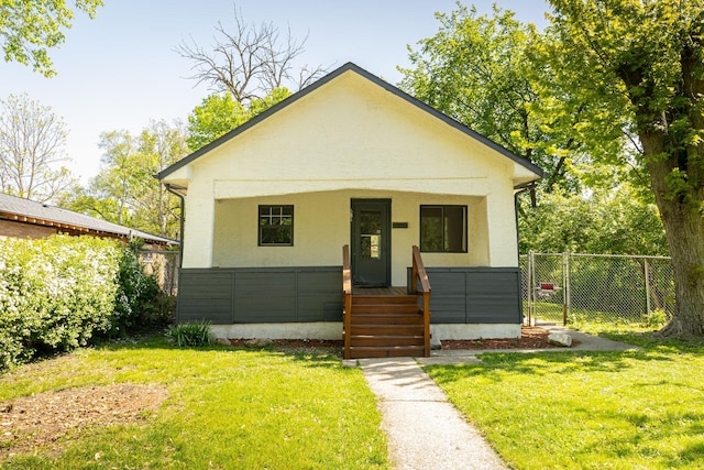 684 S Gordon Ave, Kankakee, IL 60901 - bungalow-style house featuring covered porch and stucco siding