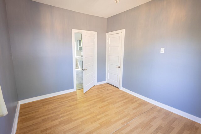 684 S Gordon Ave, Kankakee, IL 60901 - spare room featuring light wood-style floors and baseboards