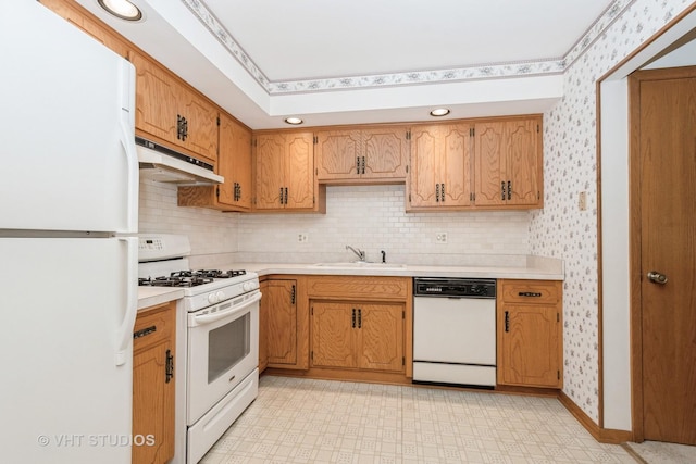 15309 S 73rd Ave Unit 15309, Orland Park, IL 60462 - kitchen with white appliances, under cabinet range hood, wallpapered walls, light flooring, and light countertops