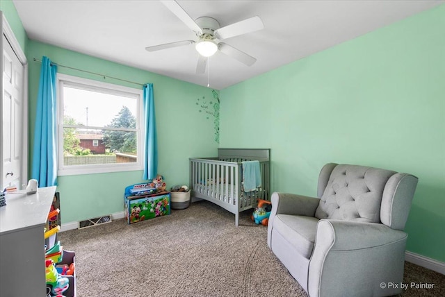 26 W Pine Ave, Cortland, IL 60112 - bedroom with a nursery area, carpet floors, and a ceiling fan