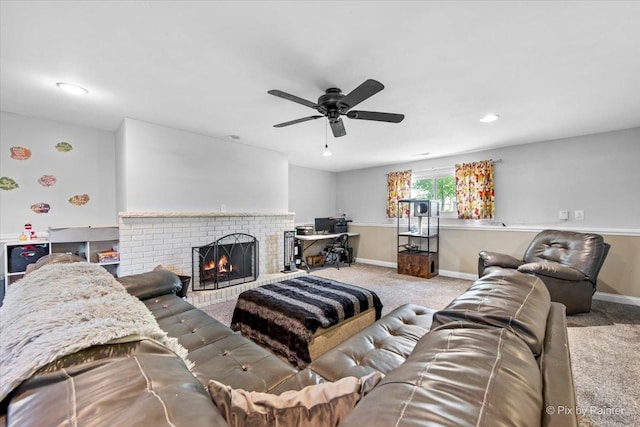 26 W Pine Ave, Cortland, IL 60112 - carpeted living room with a brick fireplace, a ceiling fan, and recessed lighting