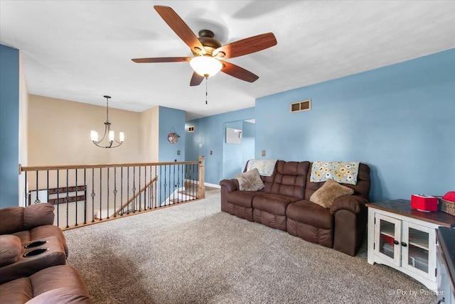 26 W Pine Ave, Cortland, IL 60112 - living area featuring a chandelier, a ceiling fan, and carpet flooring