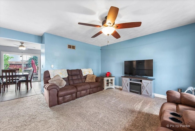 26 W Pine Ave, Cortland, IL 60112 - carpeted living area with a ceiling fan