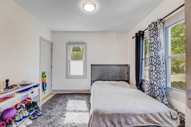 1030 Spruce St, Aurora, IL 60506 - bedroom with wood finished floors and baseboards