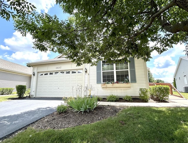 21217 Lily Lake Ln, Crest Hill, IL 60403 - view of front facade with driveway and a garage