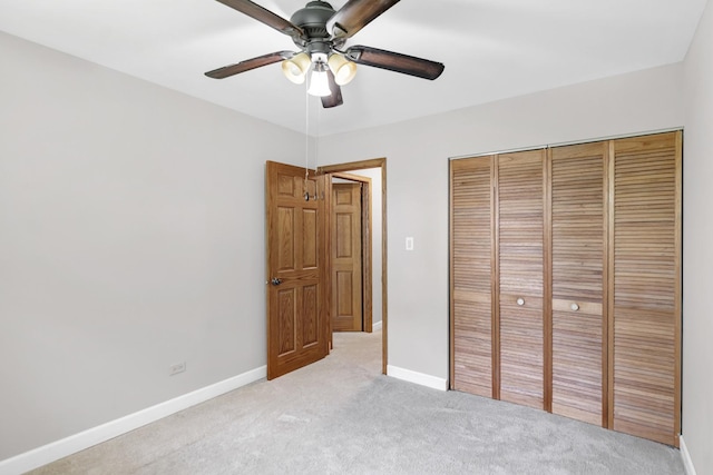 7 Walnut Dr, North Aurora, IL 60542 - unfurnished bedroom with light carpet, a closet, and a ceiling fan