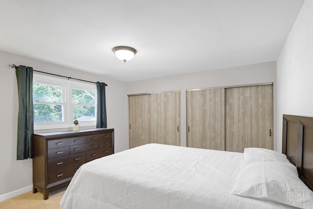 7 Walnut Dr, North Aurora, IL 60542 - bedroom with two closets and baseboards