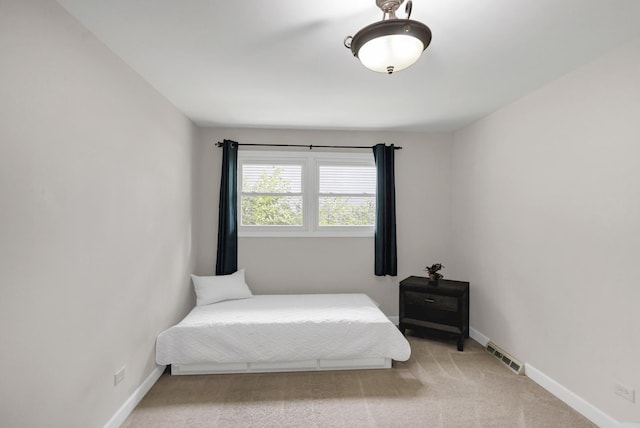 7 Walnut Dr, North Aurora, IL 60542 - bedroom with light carpet and baseboards