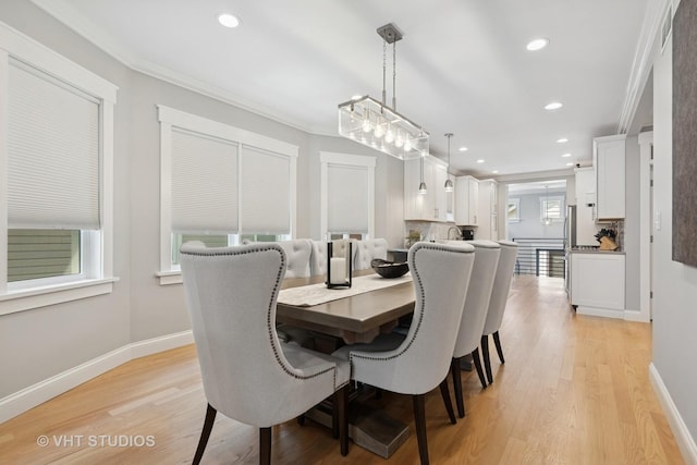 6848 N Oriole Ave, Chicago, IL 60631 - dining space featuring recessed lighting, crown molding, and light wood-style flooring