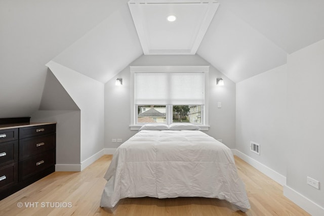 6848 N Oriole Ave, Chicago, IL 60631 - bedroom featuring light wood-type flooring and vaulted ceiling