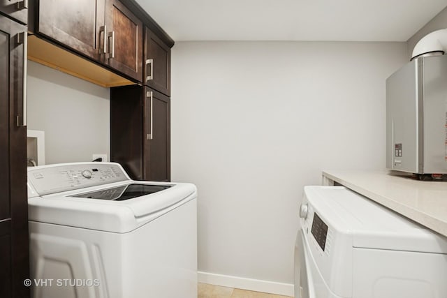 6848 N Oriole Ave, Chicago, IL 60631 - laundry room featuring cabinet space and washing machine and dryer