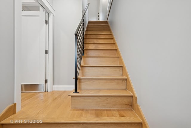 6848 N Oriole Ave, Chicago, IL 60631 - staircase with wood finished floors and baseboards