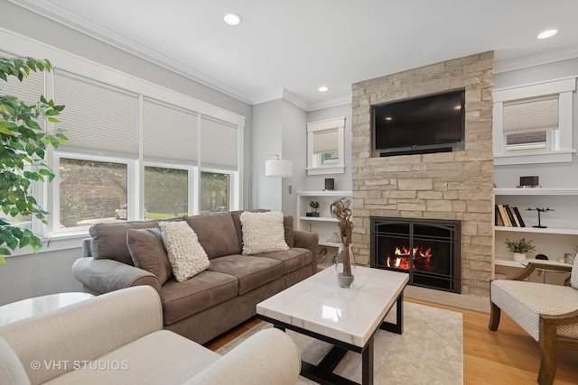 6848 N Oriole Ave, Chicago, IL 60631 - living room featuring a fireplace, light wood finished floors, crown molding, recessed lighting, and built in features