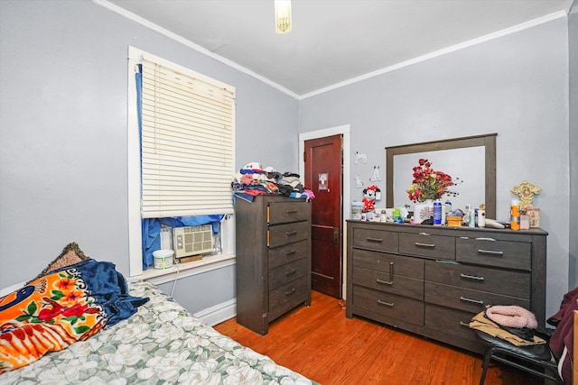 1916 N Lowell Ave, Chicago, IL 60639 - bedroom featuring ornamental molding, light wood-type flooring, and cooling unit