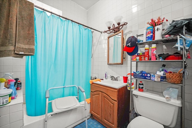 1916 N Lowell Ave, Chicago, IL 60639 - bathroom featuring tile walls, vanity, and decorative backsplash