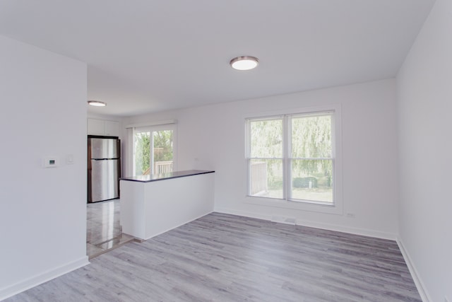 815 Concord Cv, Hoffman Estates, IL 60192 - spare room with light wood-type flooring and baseboards
