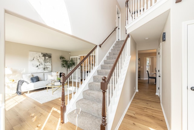25030 Round Barn Rd, Plainfield, IL 60585 - stairway with a high ceiling and wood finished floors