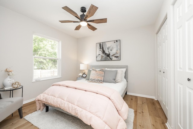25030 Round Barn Rd, Plainfield, IL 60585 - bedroom featuring a closet, light wood-type flooring, and ceiling fan