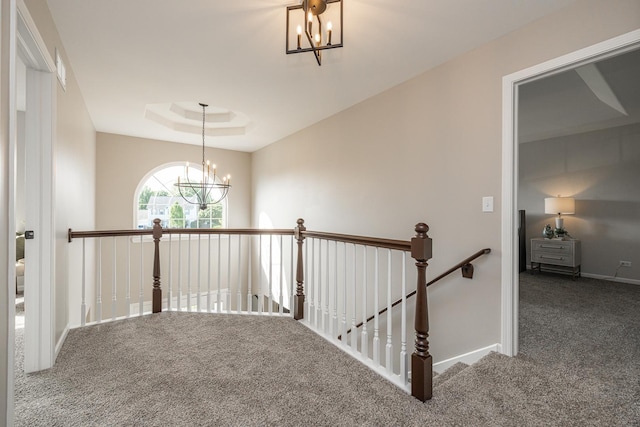 25030 Round Barn Rd, Plainfield, IL 60585 - hallway with a chandelier, an upstairs landing, and carpet floors