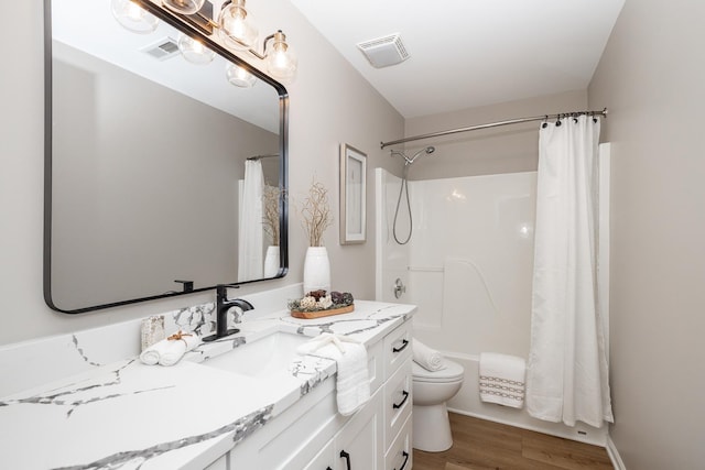 25030 Round Barn Rd, Plainfield, IL 60585 - full bath featuring vanity, wood finished floors, and shower / bath combo