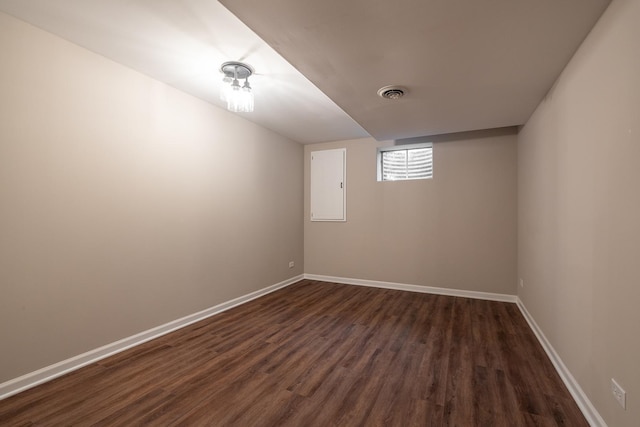 25030 Round Barn Rd, Plainfield, IL 60585 - empty room with dark wood-style floors and baseboards