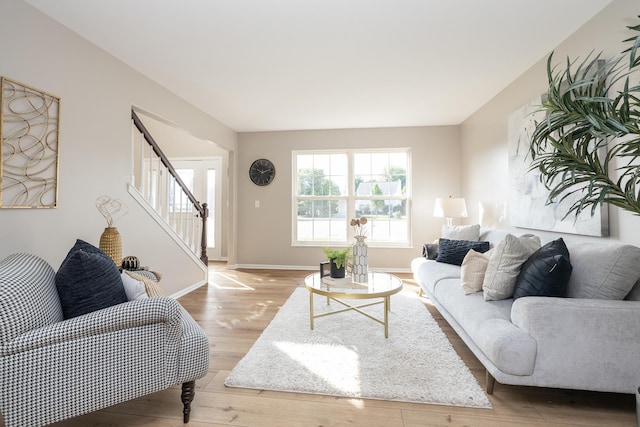 25030 Round Barn Rd, Plainfield, IL 60585 - living area with stairway and light wood-type flooring
